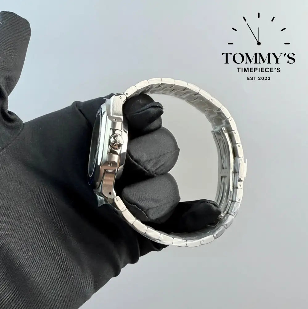 Aaa + Nautilus With A Diamond Bezel