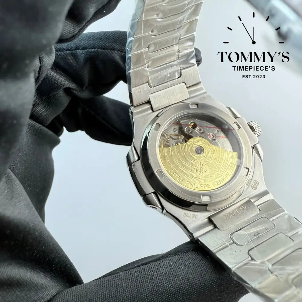 Aaa + Nautilus With A Diamond Bezel