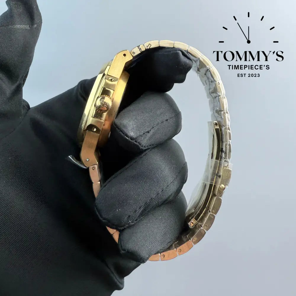 AAA + Yellow Gold Nautilus