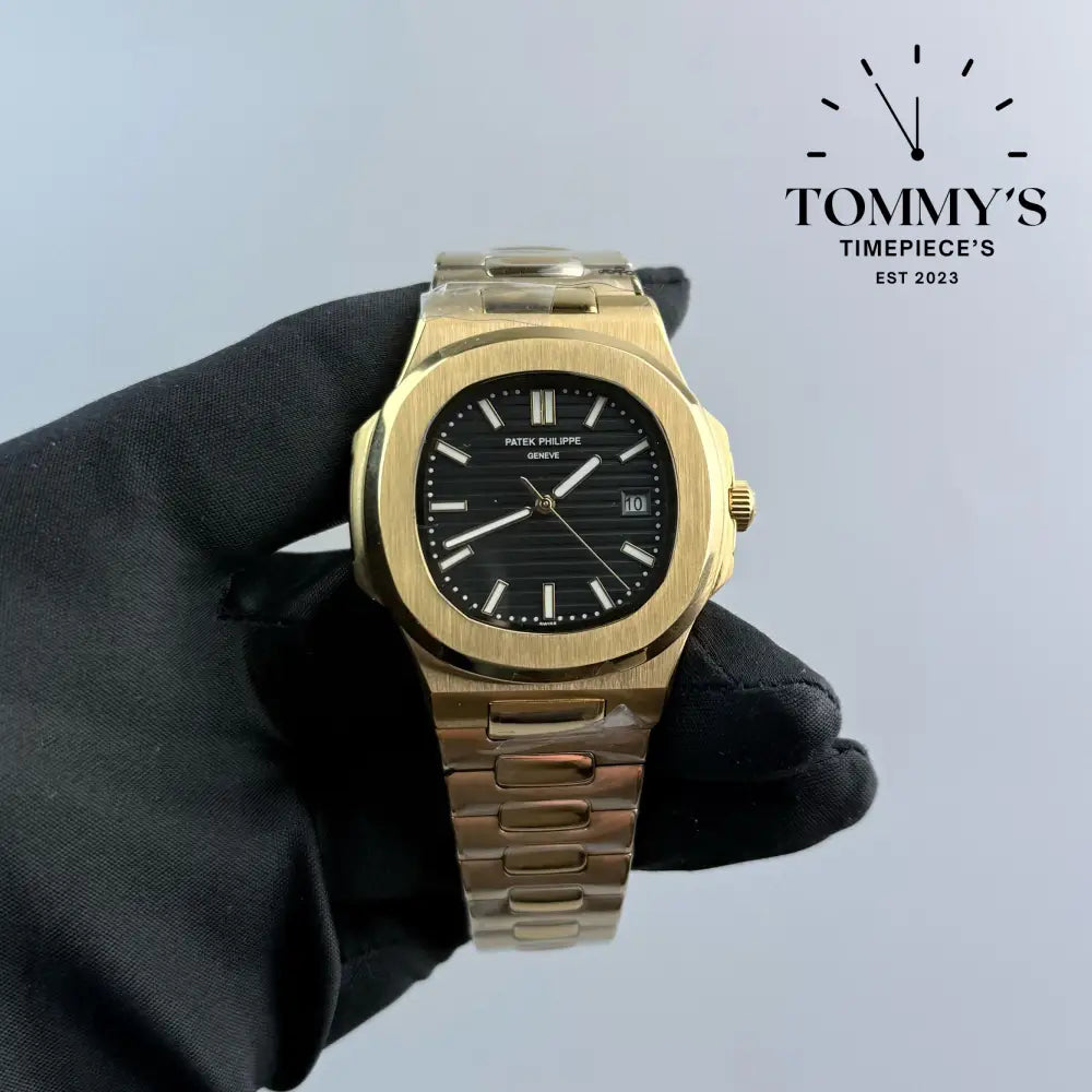 AAA + Yellow Gold Nautilus